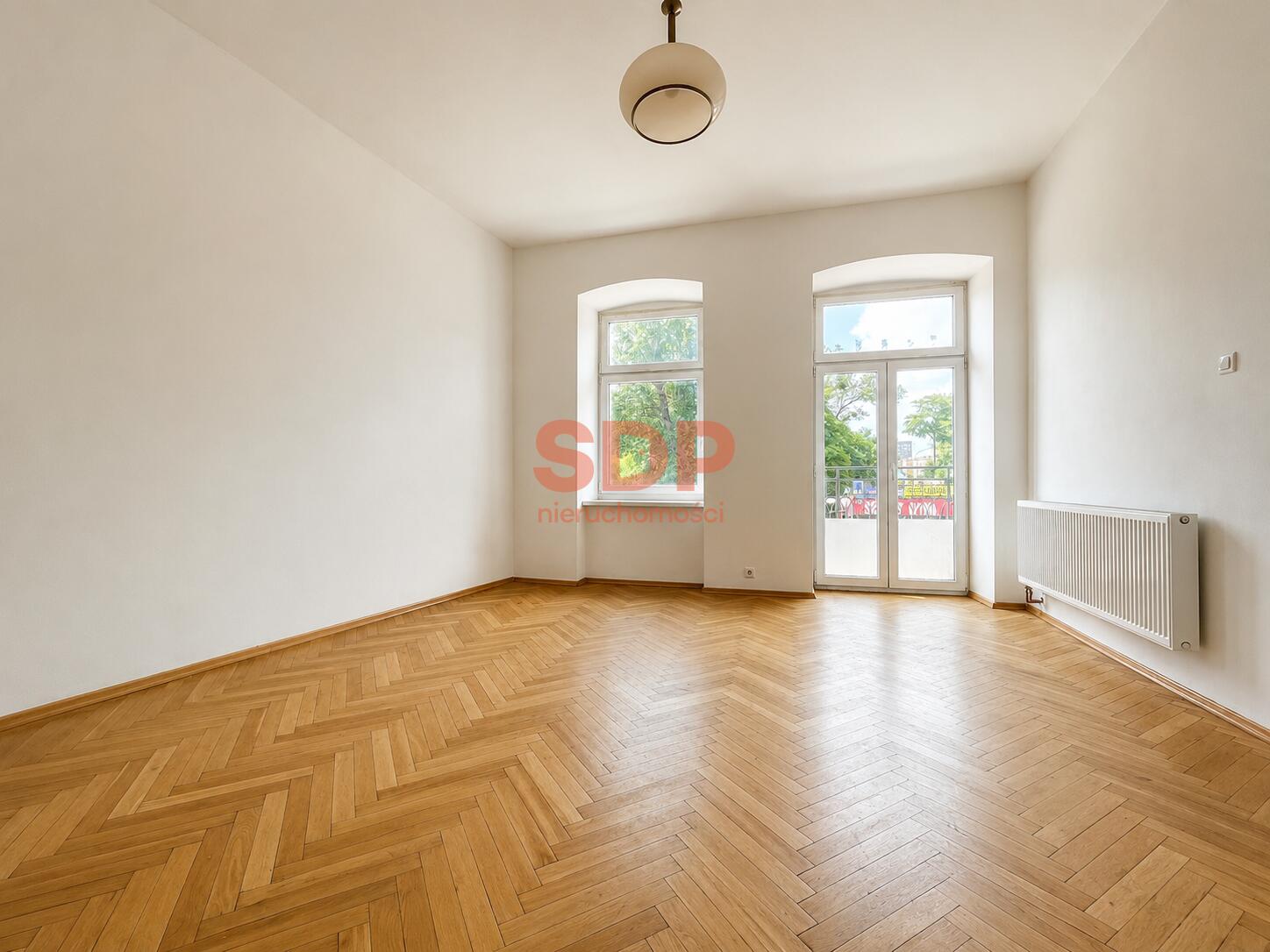 Duża kawalerka z balkonem w kamienicy